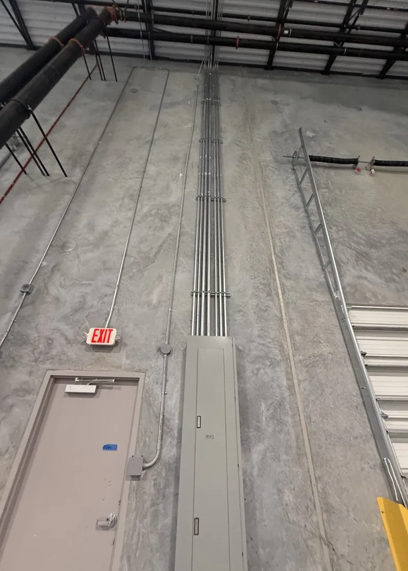 commercial conduit riser and distribution panel installed by SouthTech Electric