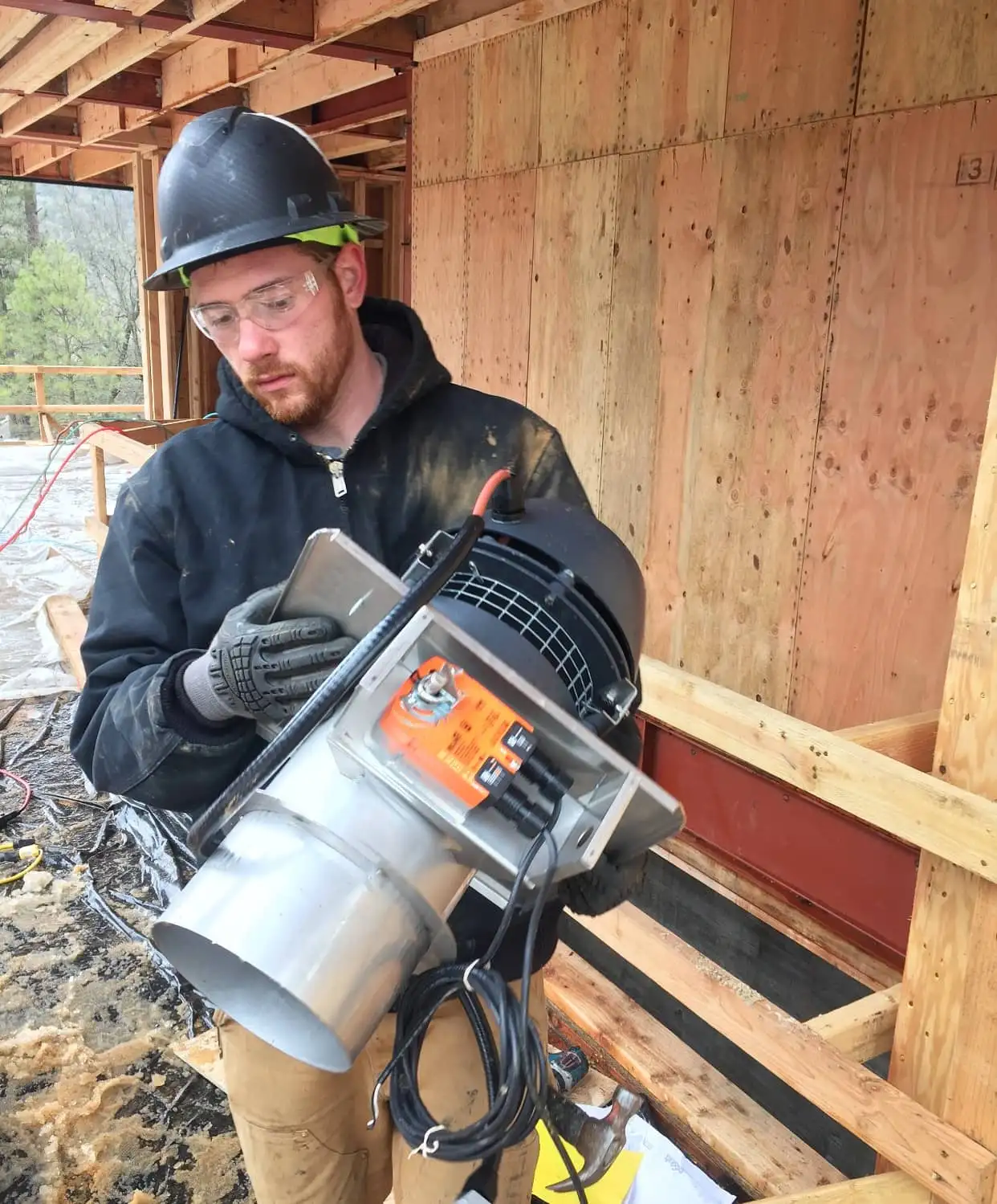 Jesse Cilluffo, owner of SouthTech Electric, working on site